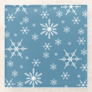 Kerst sneeuwvlok op blauw glazen onderzetter