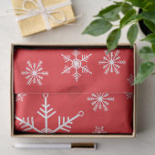 Kerst sneeuwvlok op rood tissuepapier (Geschenk)