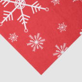 Kerst sneeuwvlok op rood tissuepapier (Detail)