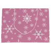 Kerst sneeuwvlok op roze groot cadeauzakje (Voorkant)