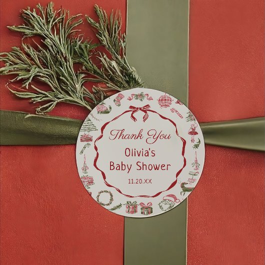 Kerst sticker met rode strik voor babyshower