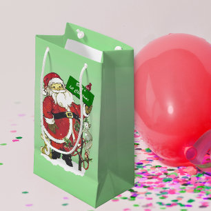 Kerst voor de baby met leuk bordje van Kerstman Klein Cadeauzakje