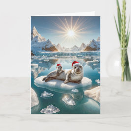 Kerst zeehond en pup op ijs feestdagen kaart