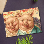 kerstabel feestdagenkaart<br><div class="desc">Creepy Pigs met kerstfeestkaart.</div>