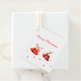 Kerstabel met rode kerstcellen, versierd met tekst bedankjes labels