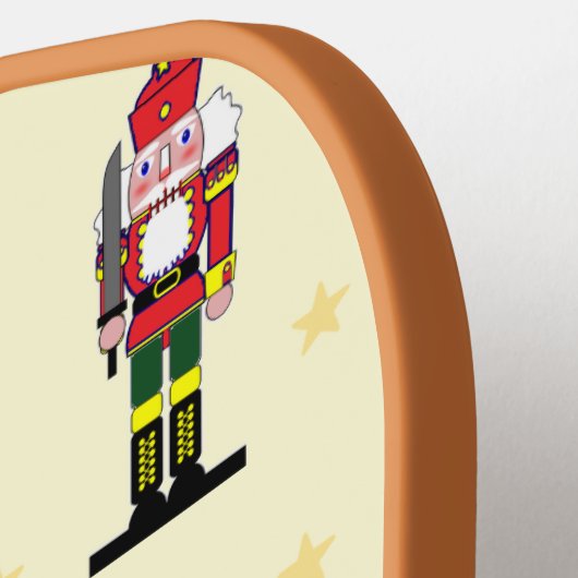 Kerstagebit met geel patroon pickleball paddle (Links Detail)