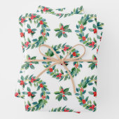 Kerstaire holly patroon van papierbladen inpakpapier vel (In situ)