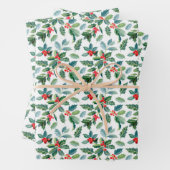Kerstaire holly patroon van papierbladen inpakpapier vel (In situ)