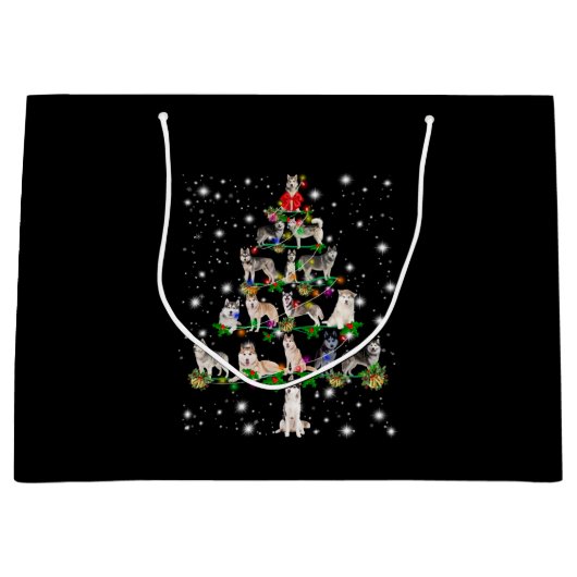 Kerstaire kerstboom, bedekt door vlieglicht groot cadeauzakje (Voorkant)