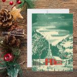 Kerstak van de Vintage, sneeuwval in de winter Feestdagen Kaart<br><div class="desc">Een  illustratie van de kerstvakantie,  een religieus ontwerp met een ongekend kapel in een schattige bergstad. Een winterlandschap met bergen,  bomen en sneeuw. Het origineel is een rood en groen kunstschilderij van de waterverf.</div>