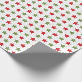 Kerstakelpapier met rode en groene sterren cadeaupapier (Hoek)