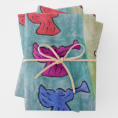 kerstangels met trompetten inpakpapier vel (In situ)