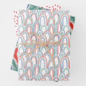 Kerstavond kerstvakantie regenboogdraak vieren inpakpapier vel (In situ)