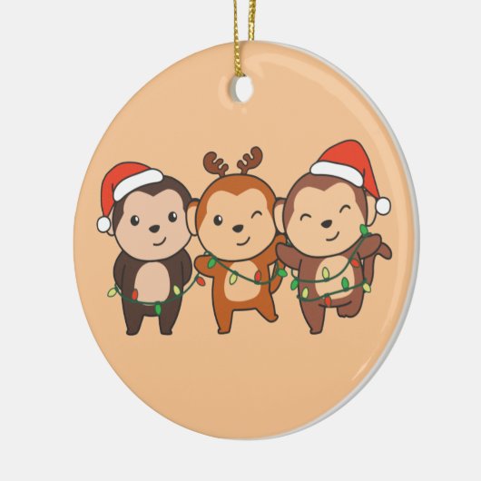 Kerstavond met apen keramisch ornament (Links)