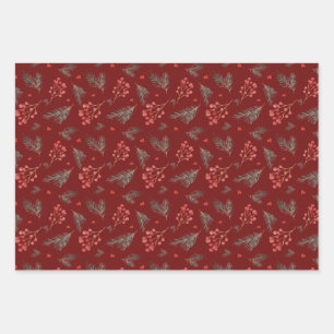 Kerstbessen en dennenappeltakken inpakpapier vel