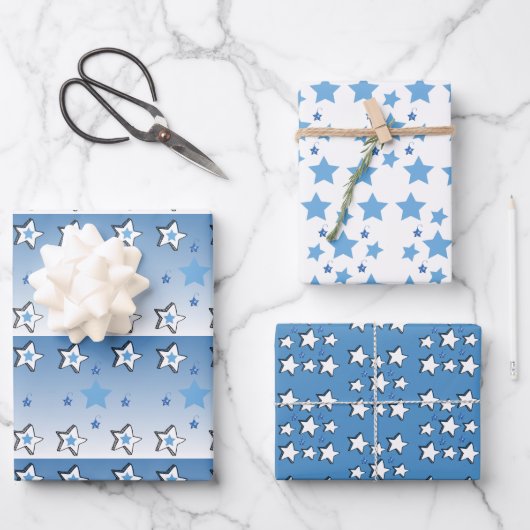 kerstbladen Wrapping White Blue Stars Inpakpapier Vel (Voorkant)