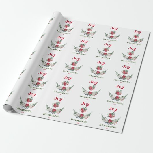 Kerstbloemstuk met witte en rode bloemen en monogr cadeaupapier (Uitgerold)