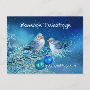 Kerstbluebirds tweeten in een besneeuwde boom feestdagenkaart