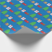 Kerstboom en geschenken op blauw inpakpapier (Hoek)