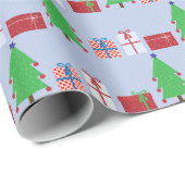 Kerstboom en geschenken op lichtblauw cadeaupapier (Rol Hoek)