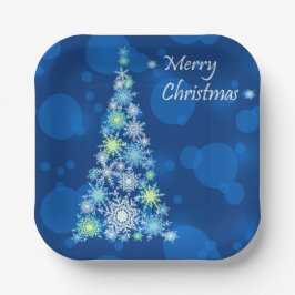 Kerstboom gemaakt van sneeuwvlokken. papieren bordje