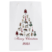 Kerstboom gemaakt van speelgoed, rood script medium cadeauzakje (Voorkant)