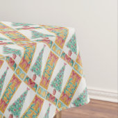 kerstboom met versiering van rode bogen en met kun tafelkleed (Voorbeeld)