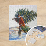 Kerstboom | N.C. Wyeth Legpuzzel<br><div class="desc">Kerstboom - Chadds Ford (1922) | N.C. Wyeth’s schilderij uit 1922, Christmas Tree – Chadds Ford, legt prachtig een winterse kerstscène vast van een man met een vers gesneden boom door het besneeuwde landschap van Chadds Ford, Pennsylvania. Het man is warm gebundeld, met zijn stevige opstelling die de moeite van...</div>
