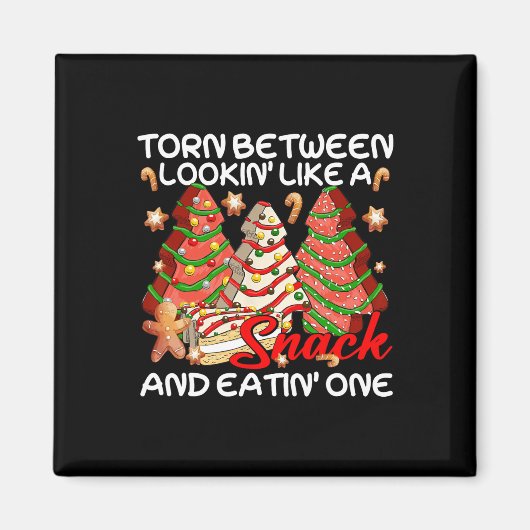 Kerstboom verscheurd tussen eruit zien als een sna magneet (Voorkant)