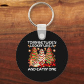 Kerstboom verscheurd tussen eruit zien als een sna sleutelhanger (Voorkant)