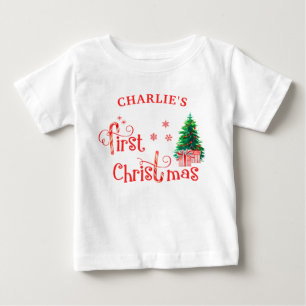 Kerstboom voor de allereerste keer voor de baby en