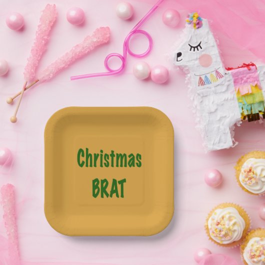 Kerstbos groene vleermuis op goud papieren bordje (Feest)