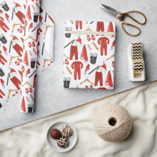 Kerstcadeau in de kleren van een speelse Kerstman Cadeaupapier