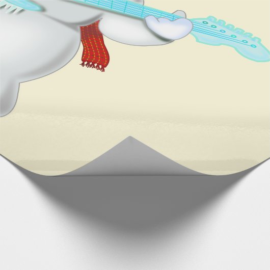 Kerstcadeau inpakpapier sneeuwpop met gitaar (Hoek)