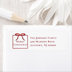 Kerstcadeau retouradres met rode strik etiket