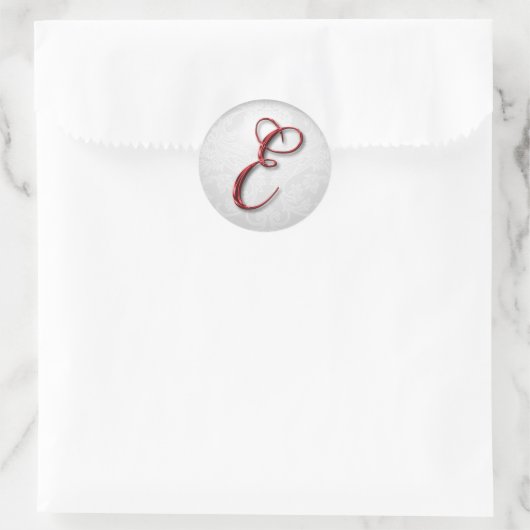 kerstcadeau sticker rood monogram (Tas)