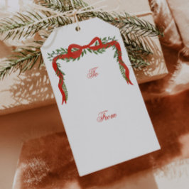 Kerstcadeaukaartjes met rode lintboog en groen cadeaulabel