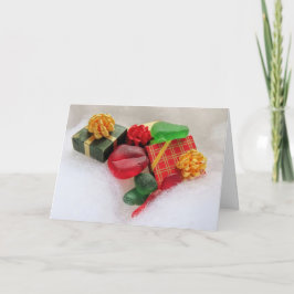 Kerstcadeaus en zeeglas kaart