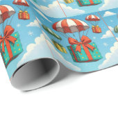 Kerstcadeaus geleverd door parachutes cadeaupapier (Rol Hoek)