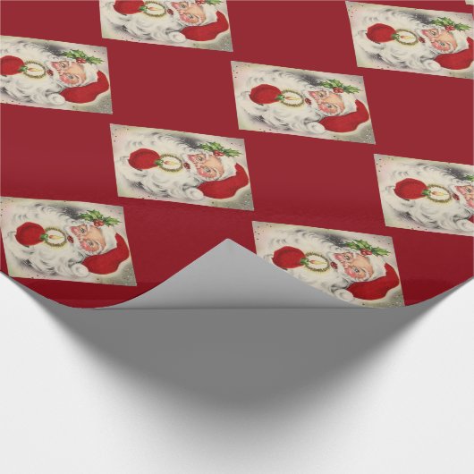 kerstcadeautje/ kerstman met kaars cadeaupapier (Hoek)