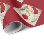 kerstcadeautje/ kerstman met kaars cadeaupapier (Rol Hoek)