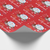 kerstcadeautje, met een zilverlige geit engel, sne cadeaupapier (Hoek)