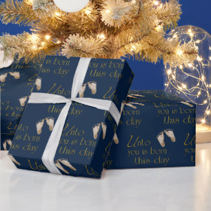 kerstcadeautjes op blauw cadeaupapier