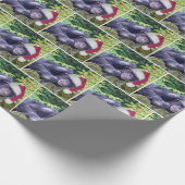 Kerstchimpansee met een kerstmuts cadeaupapier (Hoek)