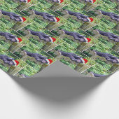 Kerstchimpansee met een kerstmuts cadeaupapier (Hoek)