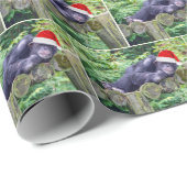 Kerstchimpansee met een kerstmuts cadeaupapier (Rol Hoek)