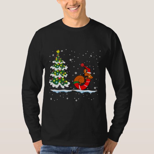kerstdachshund-hond door de sneeuw t-shirt (Voorkant)