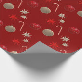 Kerstdecoratie op rood cadeaupapier (Hoek)
