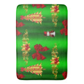 Kerstdecorpties op groen badmat (Voorkant Verticaal)
