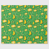 Kerstdecorpties op groen cadeaupapier (Vlak)